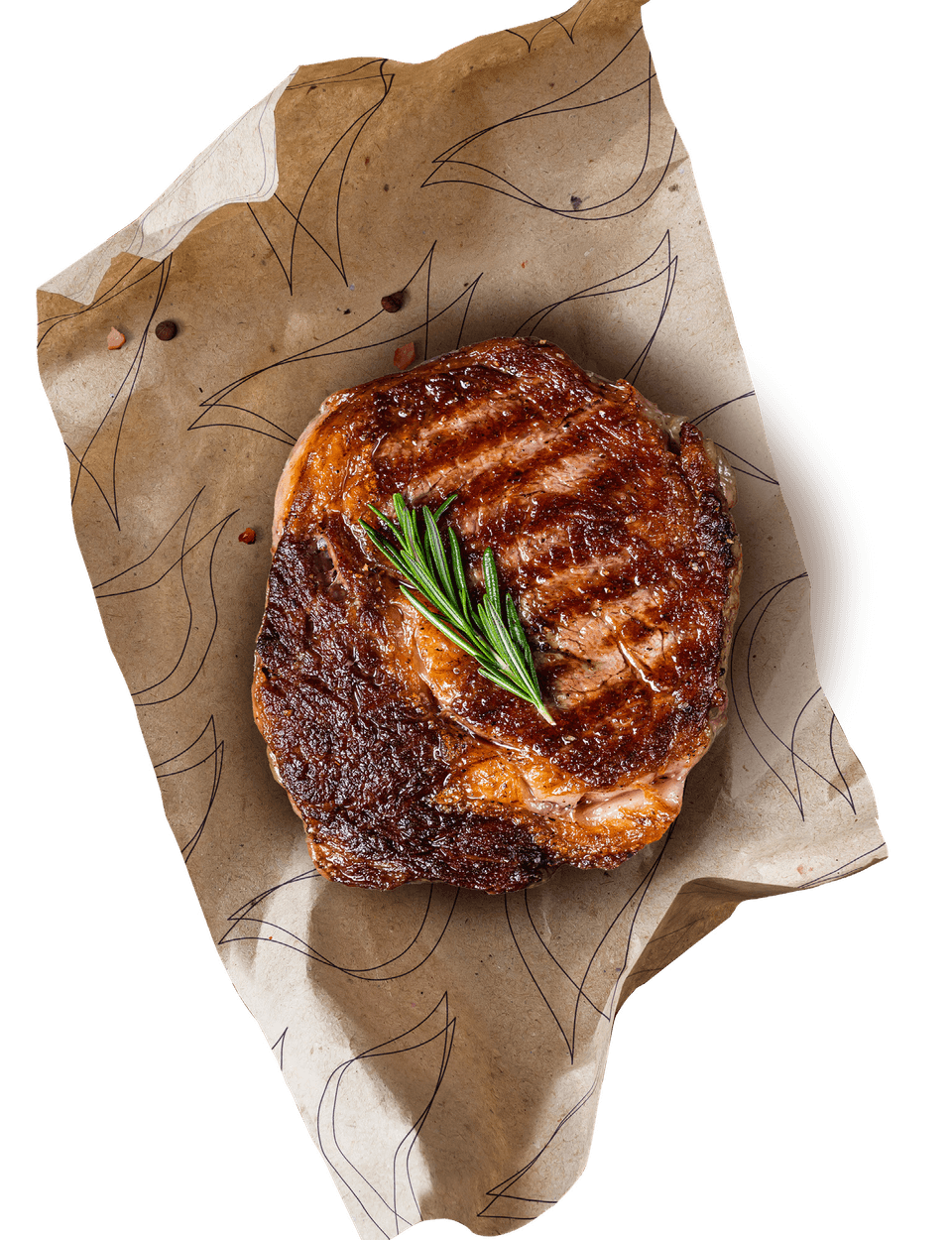 Steak aus dem Firedeck Ofen auf Papier mit Firedeck Flammen